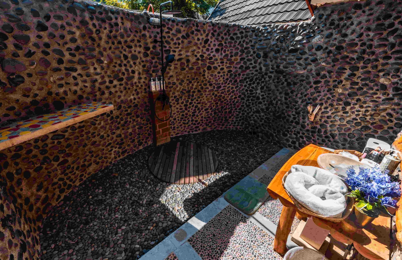 Private villa bathroom with hot water shower